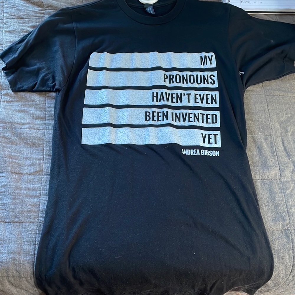 Med blk t-shirt - “My pronouns haven’t even been invented yet. - Andrea Gibson”